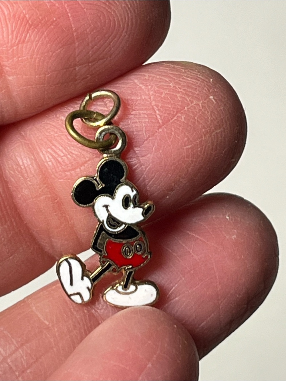 Adorable Mickey Mouse charm/pendant. Stamped Walt Disney productions on the back